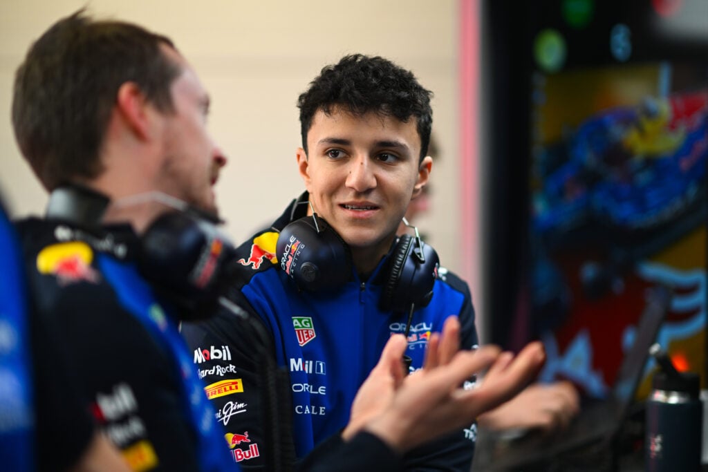 Red Bull driver Isack Hadjar in a debrief at the Barcelona shakedown