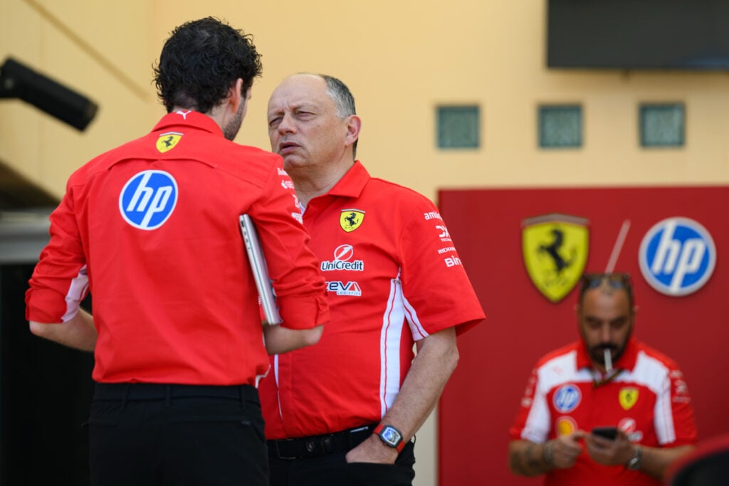Ferrari team principal Fred Vasseur speaks with a colleague in the paddock at the 2026 F1 Bahrain pre-season test