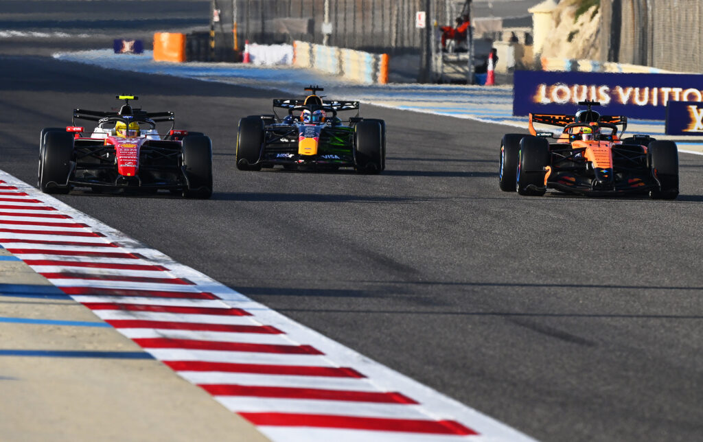 Ferrari driver Lewis Hamilton on track with Red Bull's Max Verstappen and McLaren's Oscar Piastri during F1 2026 pre-season testing in Bahrain