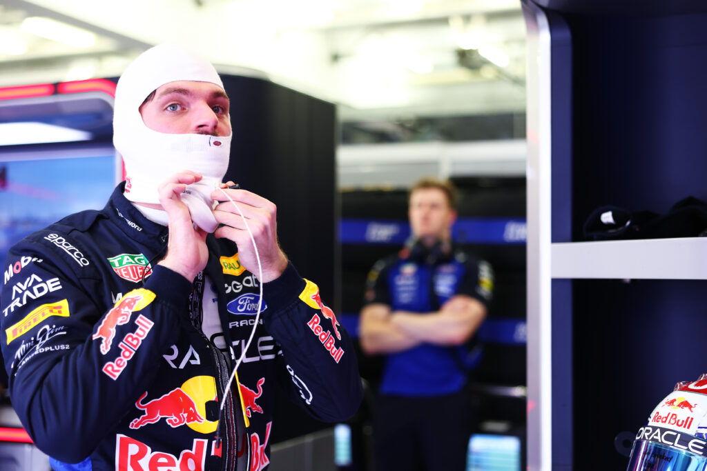 Red Bull driver Max Verstappen adjusting his balaclava at 2026 Bahrain pre-season testing