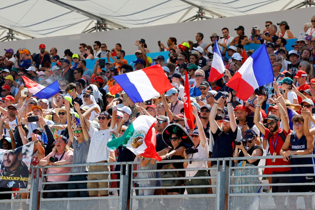 Fans waving French flags at the 2022 French Grand Prix