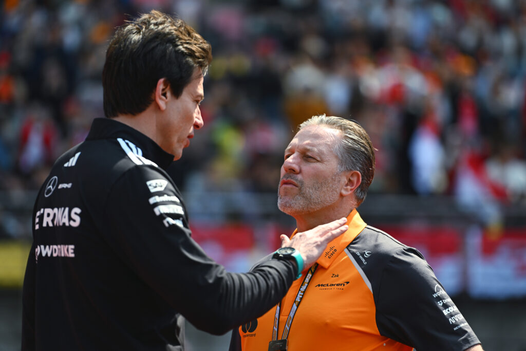 Toto Wolff, Executive Director of Mercedes AMG Petronas F1 Team and Zak Brown, Chief Executive Officer of McLaren talk in the Paddock prior to the F1 Grand Prix of China at Shanghai International Circuit on March 23, 2025 in Shanghai, China.