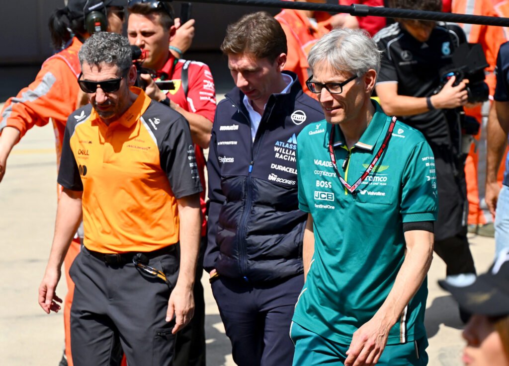 Andrea Stella, Team Principal of McLaren James Vowles, Team Principal of Williams and Mike Krack, Chief Trackside Officer of the Aston Martin F1 Team talk after the tribute to the late Eddie Jordan prior to the F1 Grand Prix of China at Shanghai International Circuit on March 23, 2025 in Shanghai, China.