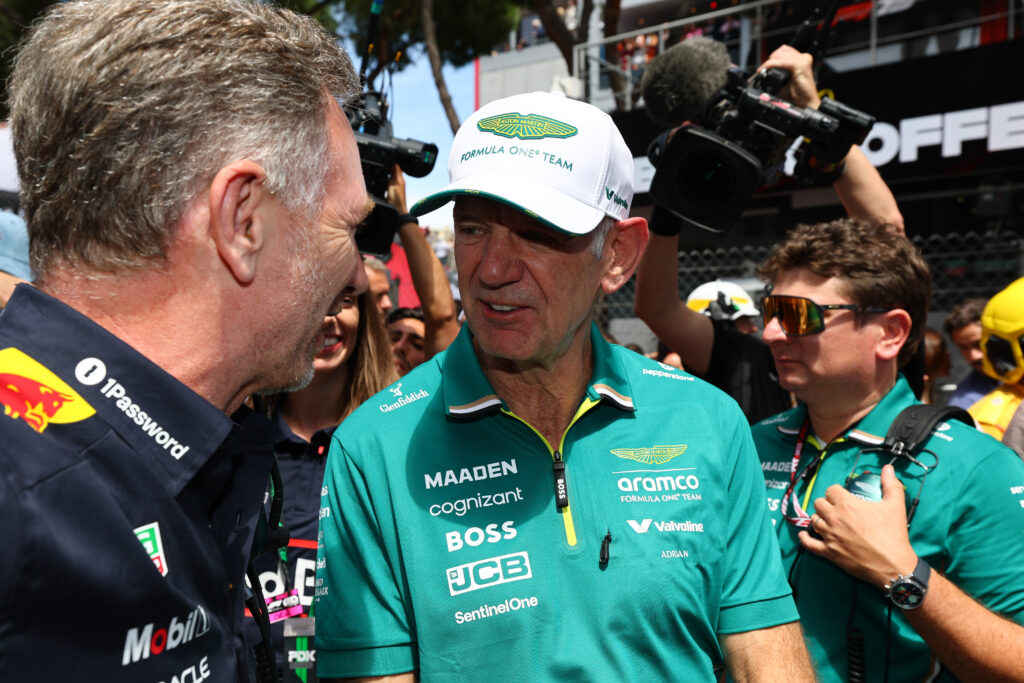 Christian Horner, Team Principal of Oracle Red Bull Racing and Adrian Newey, Managing Technical Partner of Aston Martin F1 talk on the grid during the F1 Grand Prix of Monaco at Circuit de Monaco on May 25, 2025 in Monte-Carlo, Monaco.