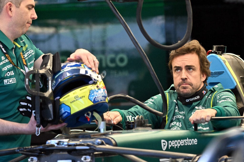 Aston Martin driver Fernando Alonso does a seat fit in the garage ahead of the 2026 F1 Australian Grand Prix