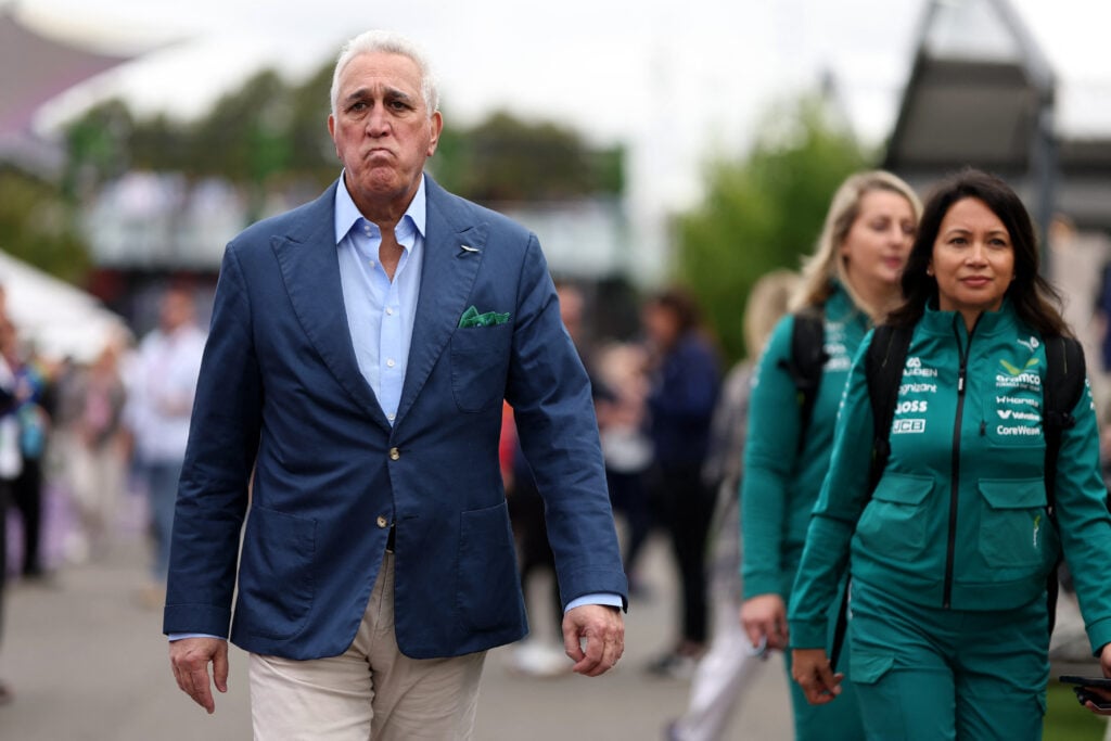 Aston Martin team owner Lawrence Stroll walks through the Melbourne paddock ahead of practice at the 2026 F1 Australian Grand Prix