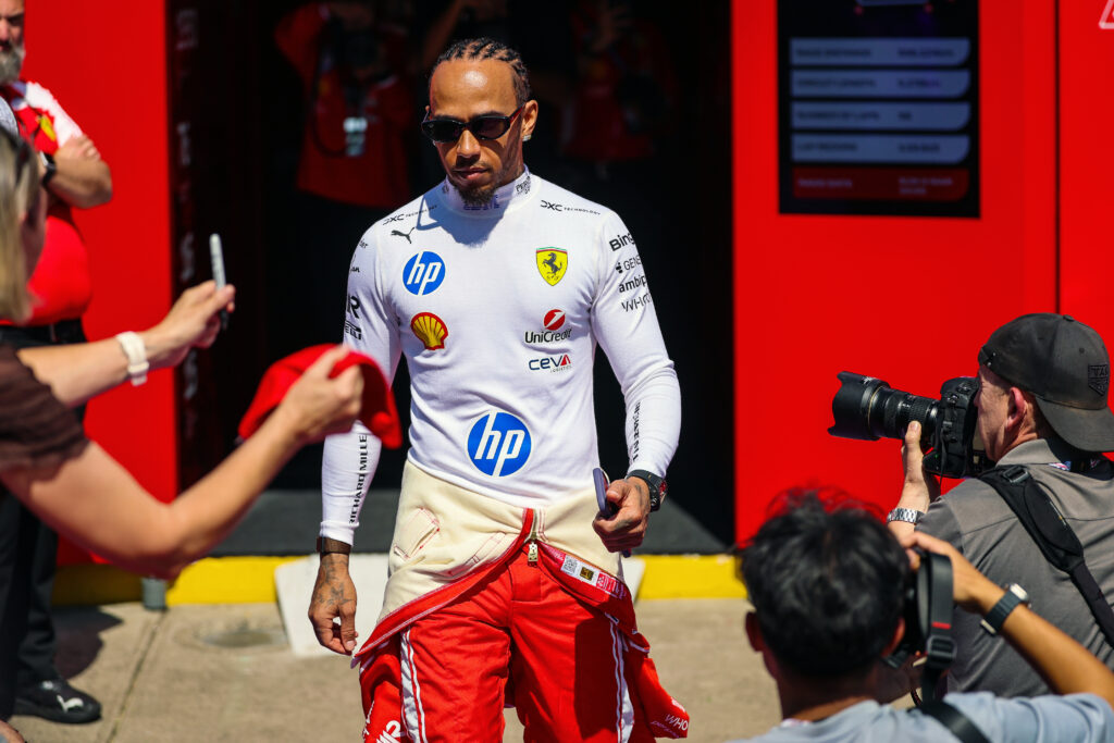 Lewis Hamilton of Great Britain and Scuderia Ferrari walks in the paddock during previews ahead of the F1 Grand Prix of Australia at Albert Park Grand Prix Circuit on March 5, 2026 in Melbourne, Australia.