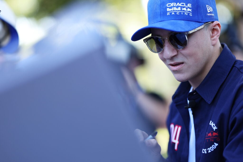 Isack Hadjar of France and Oracle Red Bull Racing signs autographs for fans on the Melbourne Walk during previews ahead of the F1 Grand Prix of Australia at Albert Park Grand Prix Circuit on March 05, 2026 in Melbourne, Australia.