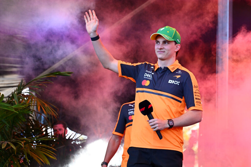 McLaren driver Oscar Piastri waving to fans at a fanzone during the 2026 Australian Grand Prix