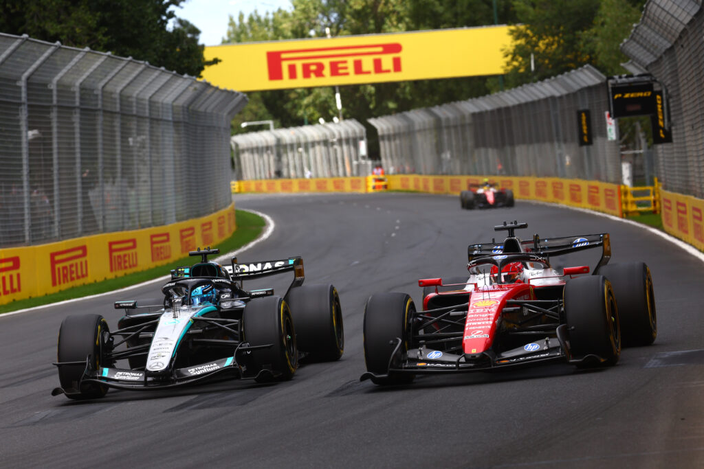 George Russell of Great Britain driving the (63) Mercedes AMG Petronas F1 Team W17 and Charles Leclerc of Monaco driving the (16) Scuderia Ferrari SF-26 battle for the lead during the F1 Grand Prix of Australia at Albert Park Grand Prix Circuit on March 08, 2026.