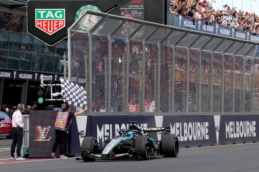 Mercedes driver George Russell taking the chequered flag at the 2026 Australian Grand Prix