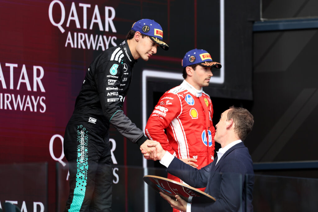Race winner George Russell of Great Britain and Mercedes AMG Petronas F1 Team receives his trophy on the podium during the F1 Grand Prix of Australia at Albert Park Grand Prix Circuit on March 08, 2026 in Melbourne, Australia.