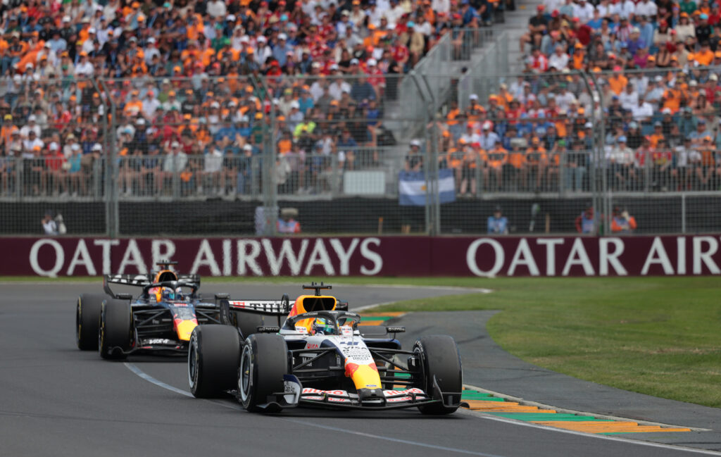 Racig Bulls driver Arvid Lindblad leading Red Bull driver Max Verstappen on the 2026 Formula 1 Australian Grand Prix