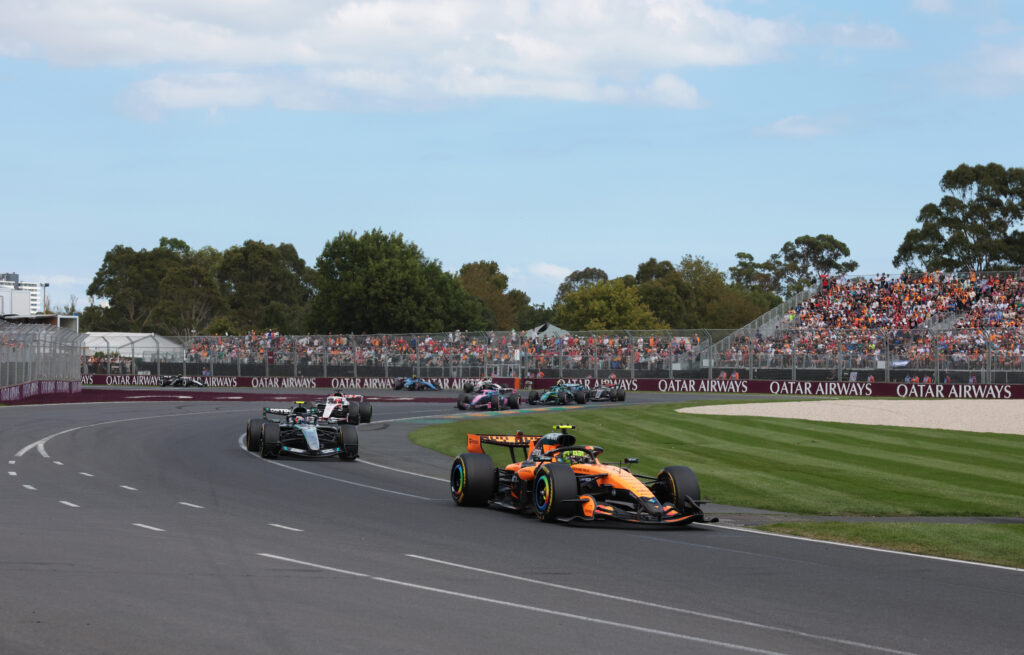 McLaren driver Lando Norris leading a group of cars at the 2026 Formula 1 Australian Grand Prix