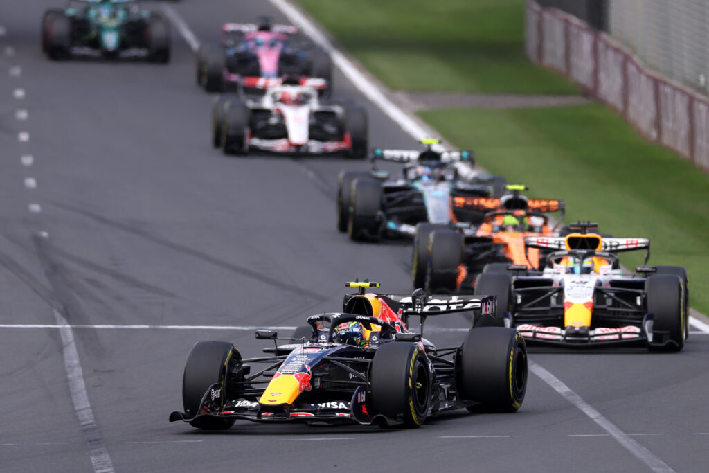 Red Bull's Isack Hadjar leads Racing Bulls' Arvid Lindblad on track during the 2026 F1 Australian Grand Prix