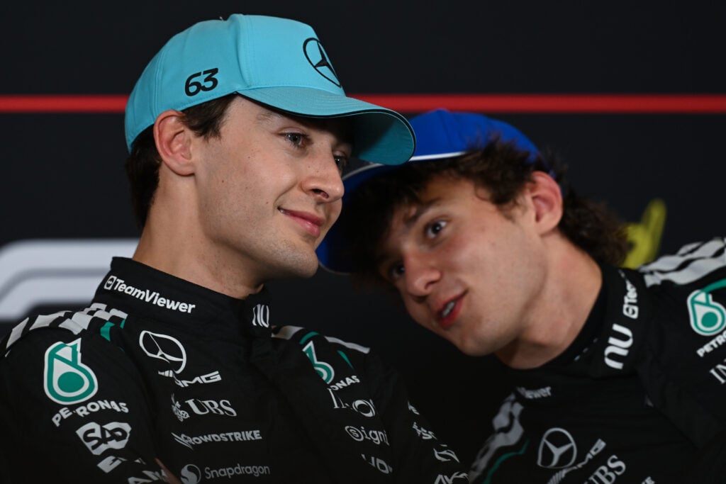 Kimi Antonelli (R) of Mercedes-AMG Petronas Formula One Team chats with George Russell (L) during the post-qualifying press conference at the 2026 Chinese Grand Prix, at the Shanghai International Circuit, in Shanghai, China, on March 14, 2026.