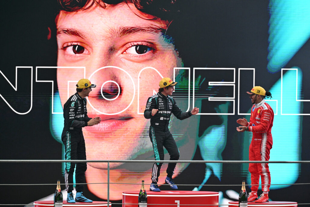 Kimi Antonelli, George Russell and Lewis Hamilton on the podium at the 2026 Chinese Grand Prix