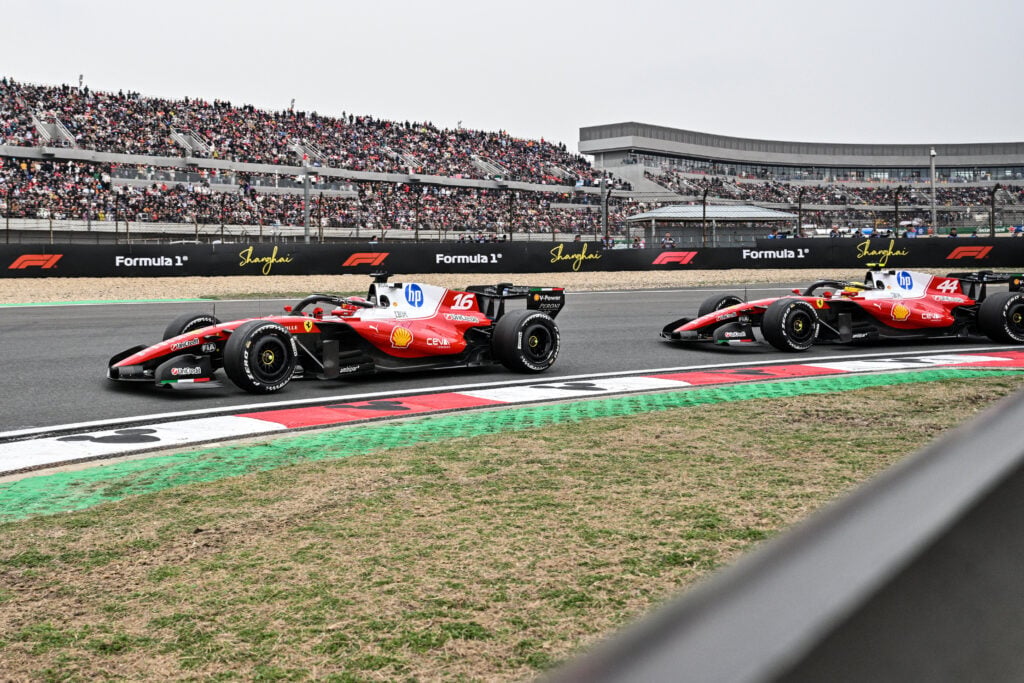 Ferrari's British driver Lewis Hamilton (R) and Ferrari's Monegasque driver Charles Leclerc (L) drive during the Formula One Chinese Grand Prix at the Shanghai International Circuit in Shanghai on March 15, 2026.