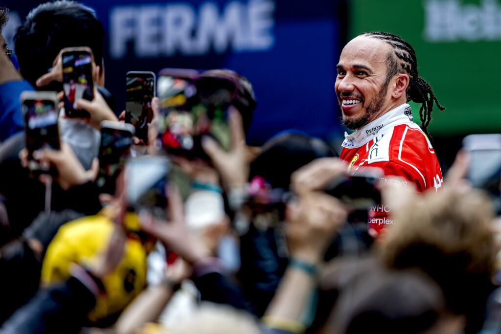 Ferrari driver Lewis Hamilton having his photograph taken at the 2026 Chinese Grand Prix
