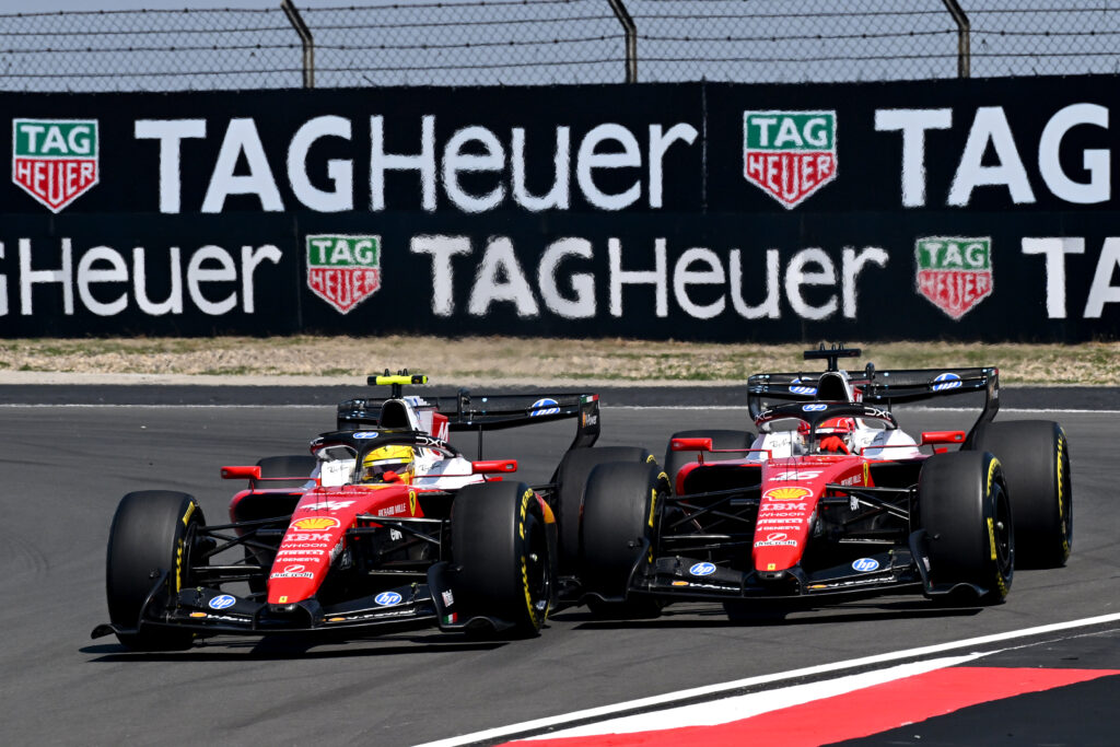 Lewis Hamilton of Great Britain driving the (44) Scuderia Ferrari SF-26 and Charles Leclerc of Monaco driving the (16) Scuderia Ferrari SF-26 battle for track position during the Sprint ahead of the F1 Grand Prix of China at Shanghai International Circuit on March 14, 2026 in Shanghai, China.