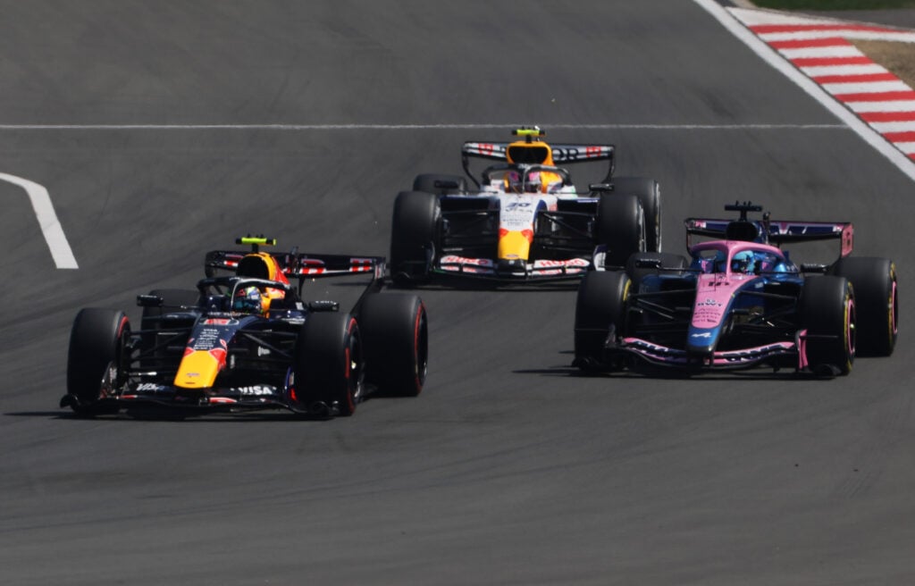 Red Bull driver Isack Hadjar on track with Alpine's Pierre Gasly and Racing Bulls' Liam Lawson during the F1 Sprint at the 2026 Chinese Grand Prix