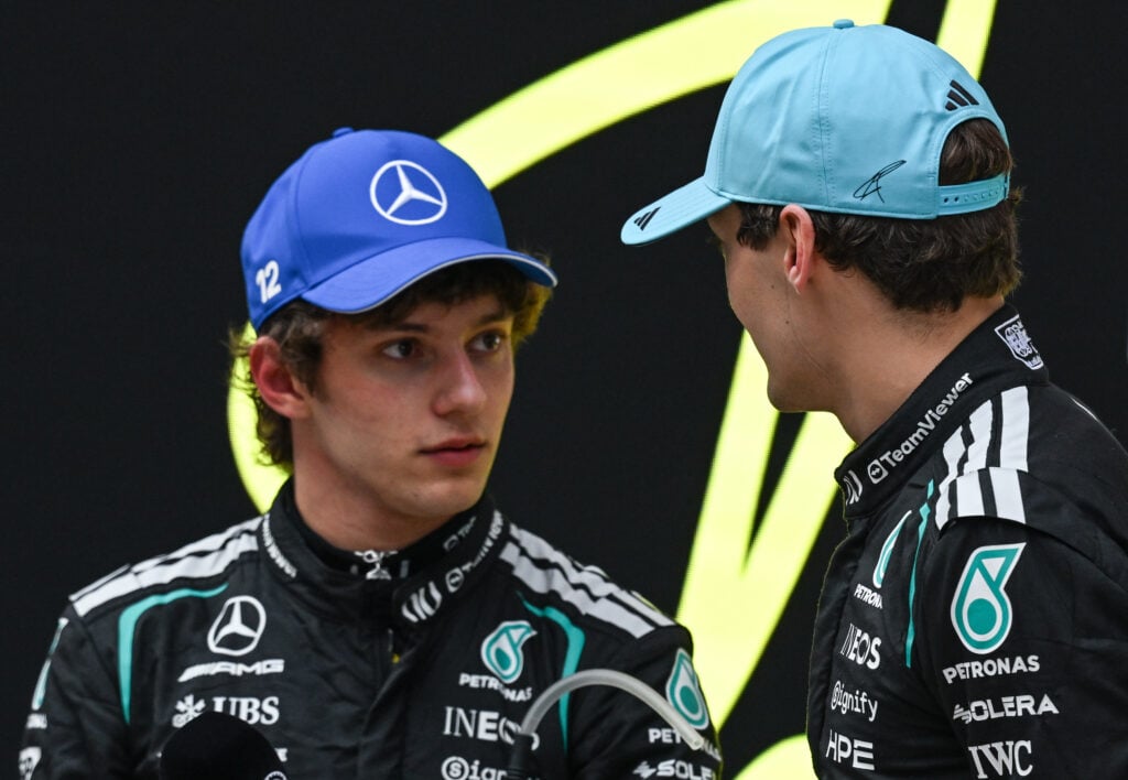 Kimi Antonelli (L) and George Russell of Mercedes-AMG Petronas Formula One Team are seen during the winners' presentation after securing a 1-2 finish in the 2026 Chinese Grand Prix, at the Shanghai International Circuit, in Shanghai, China, on March 15, 2026.