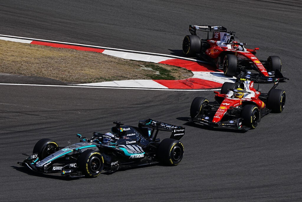 Mercedes' George Russell on track with Ferrari's Lewis Hamilton and Charles Leclerc during the Shanghai Sprint at the 2026 F1 Chinese Grand Prix