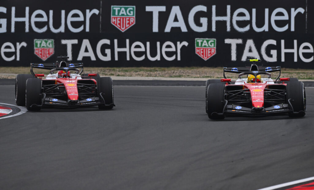 Lewis Hamilton of Great Britain driving the (44) Scuderia Ferrari SF-26 and Charles Leclerc of Monaco driving the (16) Scuderia Ferrari SF-26 battle for track position during the F1 Grand Prix of China at Shanghai International Circuit on March 15, 2026 in Shanghai, China.