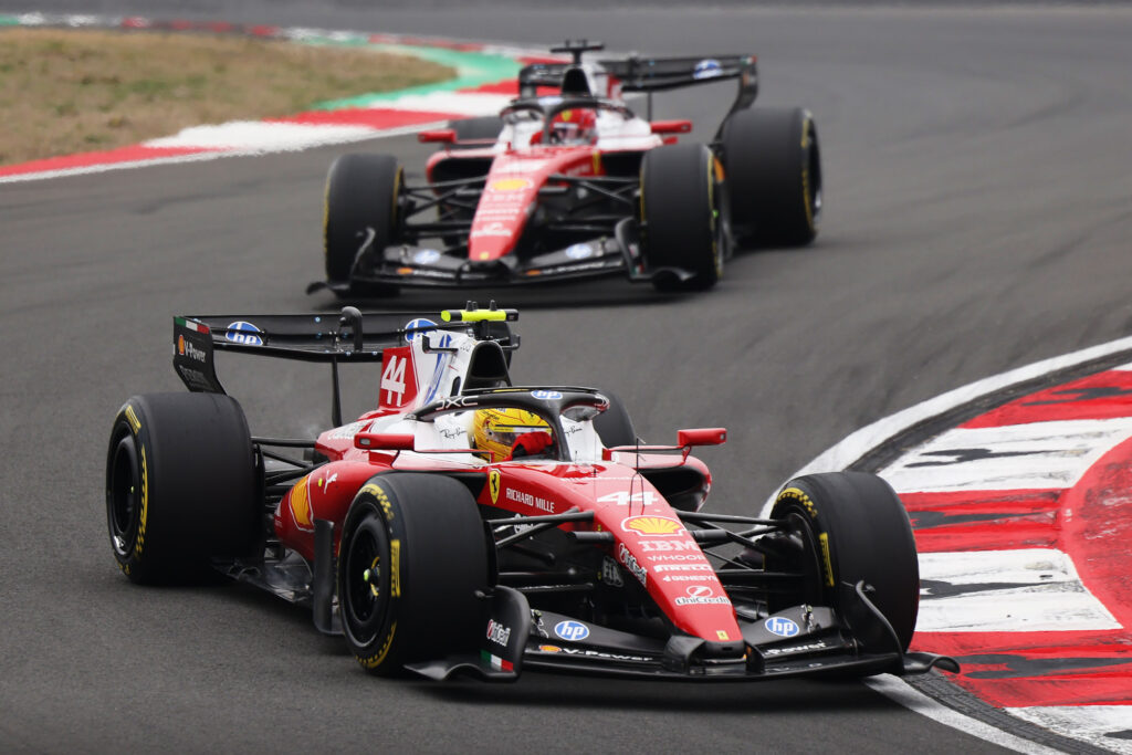 Ferrari drivers Charles Leclerc and Lewis Hamilton fight on track during the 2026 F1 Chinese Grand Prix
