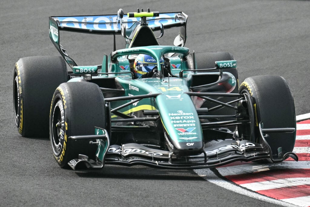 Fernando Alonso drives the Aston Martin F1 car at the Japanese Grand Prix