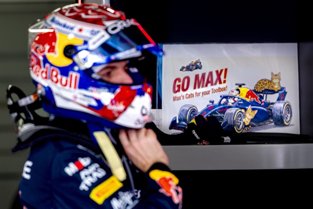 Red Bull driver Max Verstappen gets ready in the garage before the 2026 F1 Japanese Grand Prix