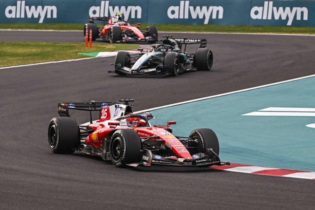 Charles Leclerc of Scuderia Ferrari leads ahead of George Russell of Mercedes-AMG Petronas F1 Team and Lewis Hamilton of Scuderia Ferrari during the 2026 Japanese Grand Prix at Suzuka Circuit in Suzuka, Mie Prefecture, Japan, on March 29, 2026.