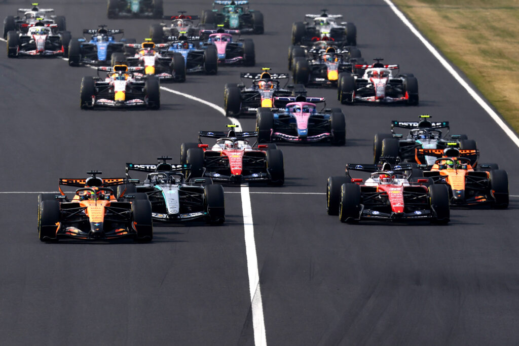 Oscar Piastri of Australia driving the (81) McLaren MCL40 Mercedes leads George Russell of Great Britain driving the (63) Mercedes AMG Petronas F1 Team W17 Charles Leclerc of Monaco driving the (16) Scuderia Ferrari SF-26 and the rest of the field at the start during the F1 Grand Prix of Japan at Suzuka Circuit on March 29, 2026 in Suzuka, Japan.