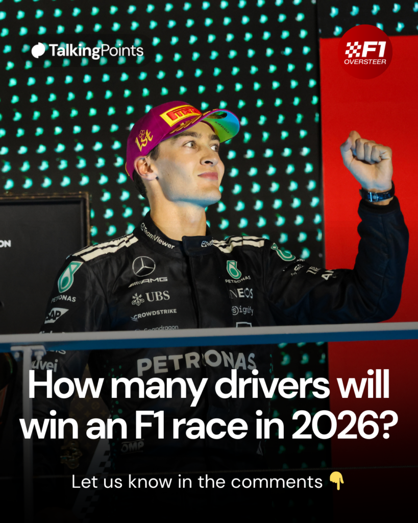 George Russell of Mercedes pumps his fist on the Singapore Grand Prix podium