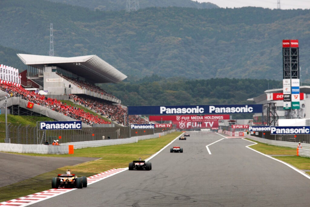 Spanish Renault Formula One driver Fernando Alonso drives his R28 racing car along the start and finish straight as he chases his rivals during the 2008 Japanese Grand Prix at the Fuji Speedway, Japan, on the 12 October 2008.
