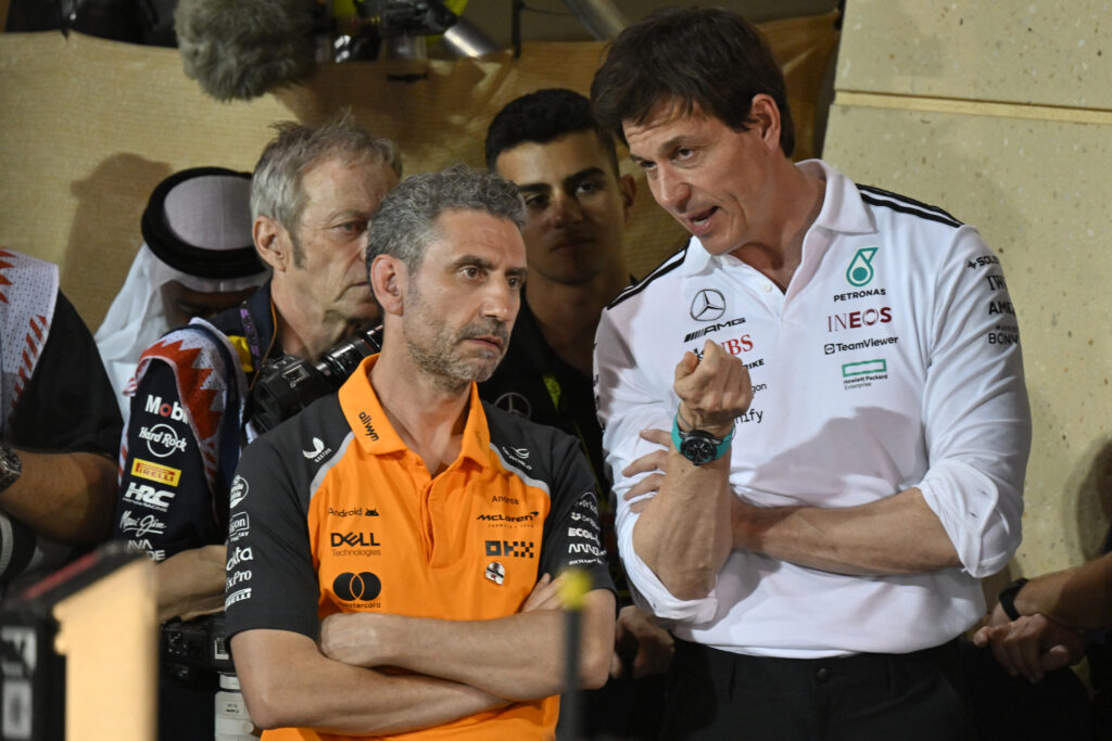 Mercedes F1 CEO and team principal Toto Wolff talks with McLaren team principal Andrea Stella after the Bahrain Formula One Grand Prix at the Bahrain International Circuit in Sakhir on April 13, 2025.