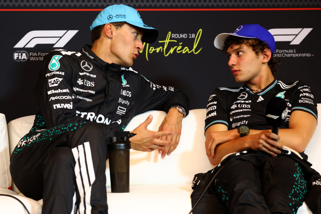 Race winner George Russell of Great Britain and Mercedes AMG Petronas F1 Team and Third placed Andrea Kimi Antonelli of Italy and Mercedes AMG Petronas F1 Team talk in the Drivers Press Conference during the F1 Grand Prix of Canada at Circuit Gilles-Villeneuve on June 15, 2025 in Montreal, Quebec.