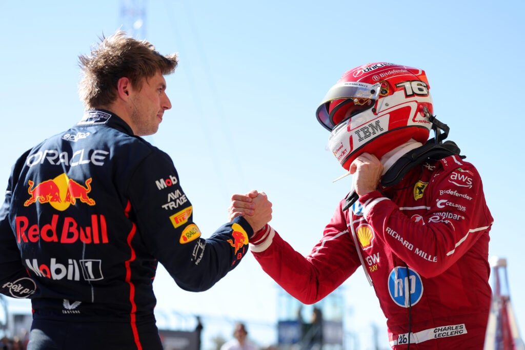 Max Verstappen of Red Bull shakes hands with Charles Leclerc of Ferrari