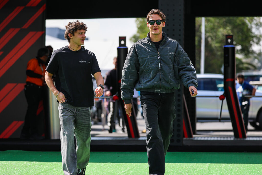 Andrea Kimi Antonelli of Italy and Mercedes walks in the paddock with George Russell of Great Britain and Mercedes during previews ahead of the F1 Grand Prix of Mexico at Autodromo Hermanos Rodriguez on October 23, 2025 in Mexico City, Mexico.