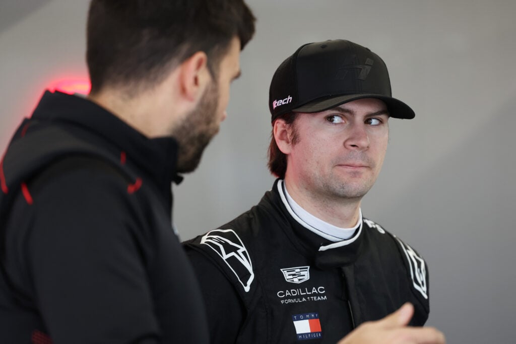 Cadillac F1 test driver Colton Herta gets ready in the Hitech GP garage during the 2026 F2 Barcelona pre-season test