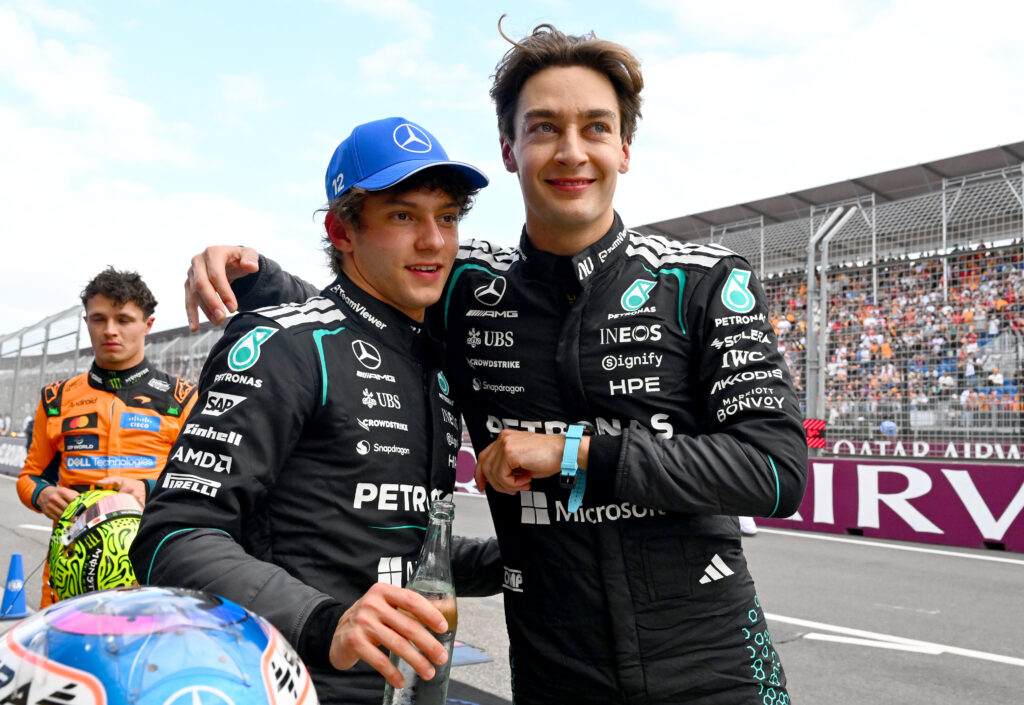 Kimi Antonelli and George Russell celebrate in parc ferme after qualifying for the 2026 F1 Australian Grand Prix