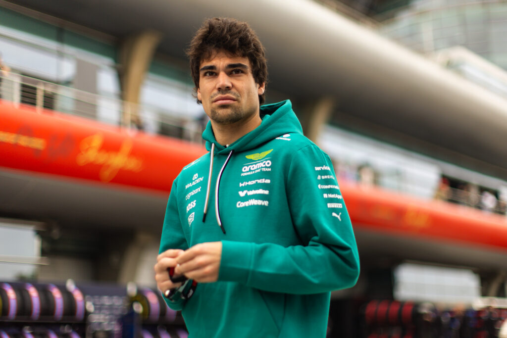 Lance Stroll of Aston Martin walking in the paddock at the 2026 Chinese Grand Prix