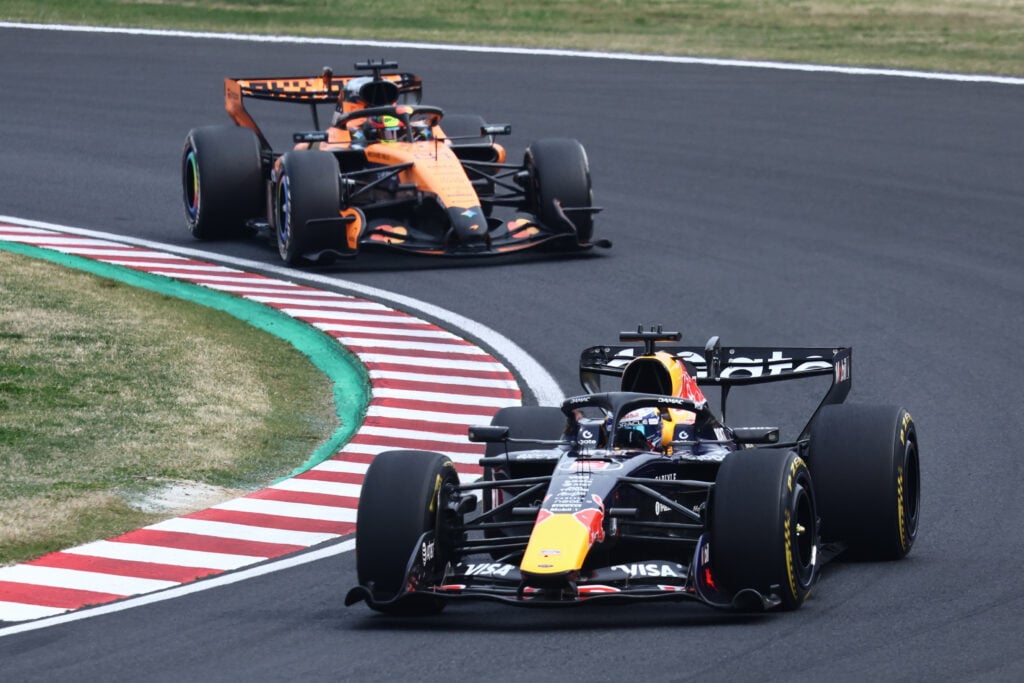 Red Bull' Max Verstappen leads McLaren's Oscar Piastri on track during the 2026 F1 Japanese Grand Prix