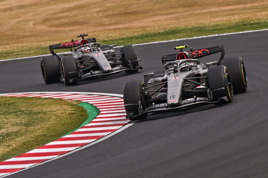 Audi driver Gabriel Bortoleto leads teammate Nico Hulkenberg on track during the 2026 F1 Japanese Grand Prix
