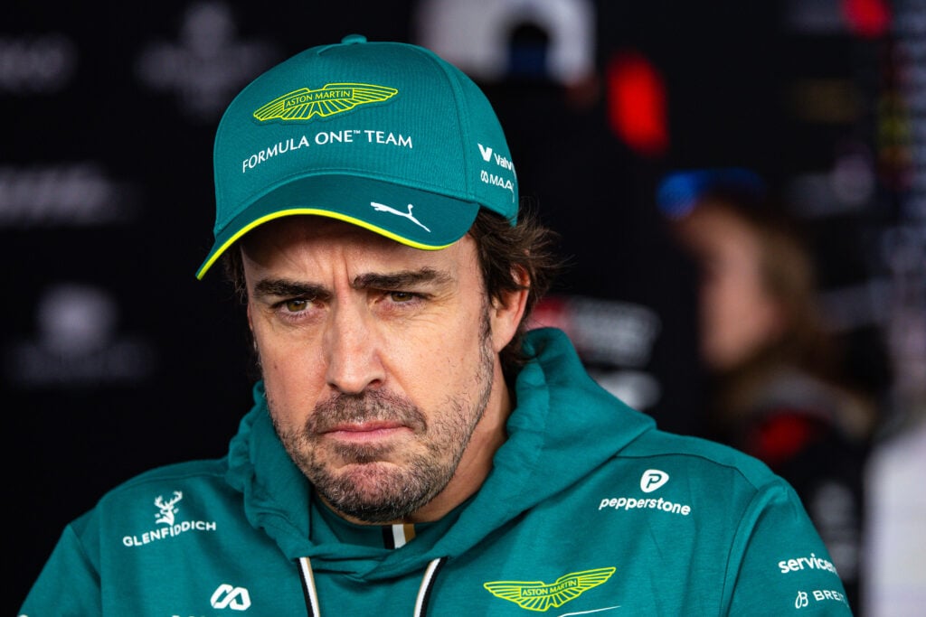 Fernando Alonso of Spain and Aston Martin F1 Team answers questions in the TV media pen during qualifying ahead of the F1 Grand Prix of Japan at Suzuka Circuit on March 28, 2026 in Suzuka, Japan.