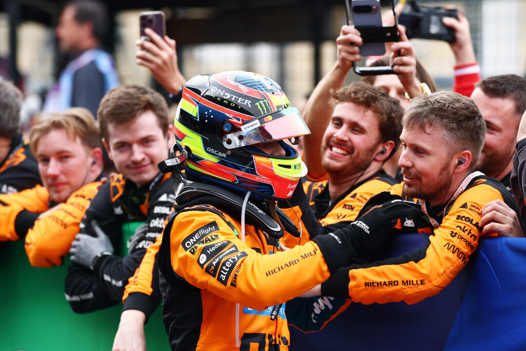 Second placed Oscar Piastri of Australia and McLaren celebrates with his team in parc ferme during the F1 Grand Prix of Japan at Suzuka Circuit on March 29, 2026 in Suzuka, Japan.