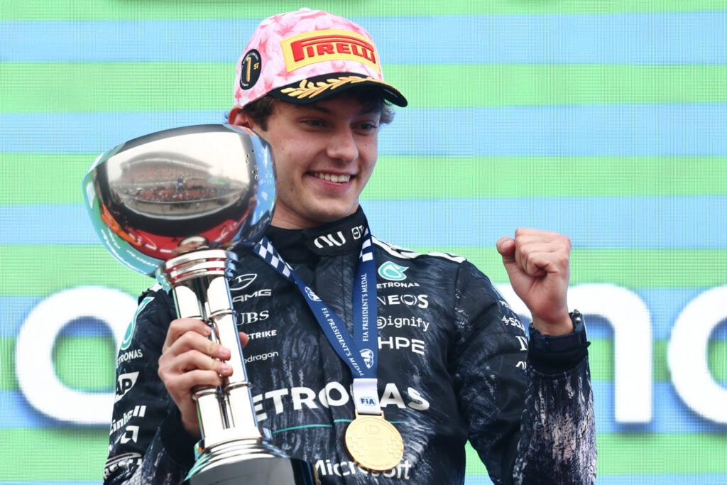 Mercedes driver Andrea Kimi Antonelli celebrates winning the 2026 F1 Japanese Grand Prix on the Suzuka podium