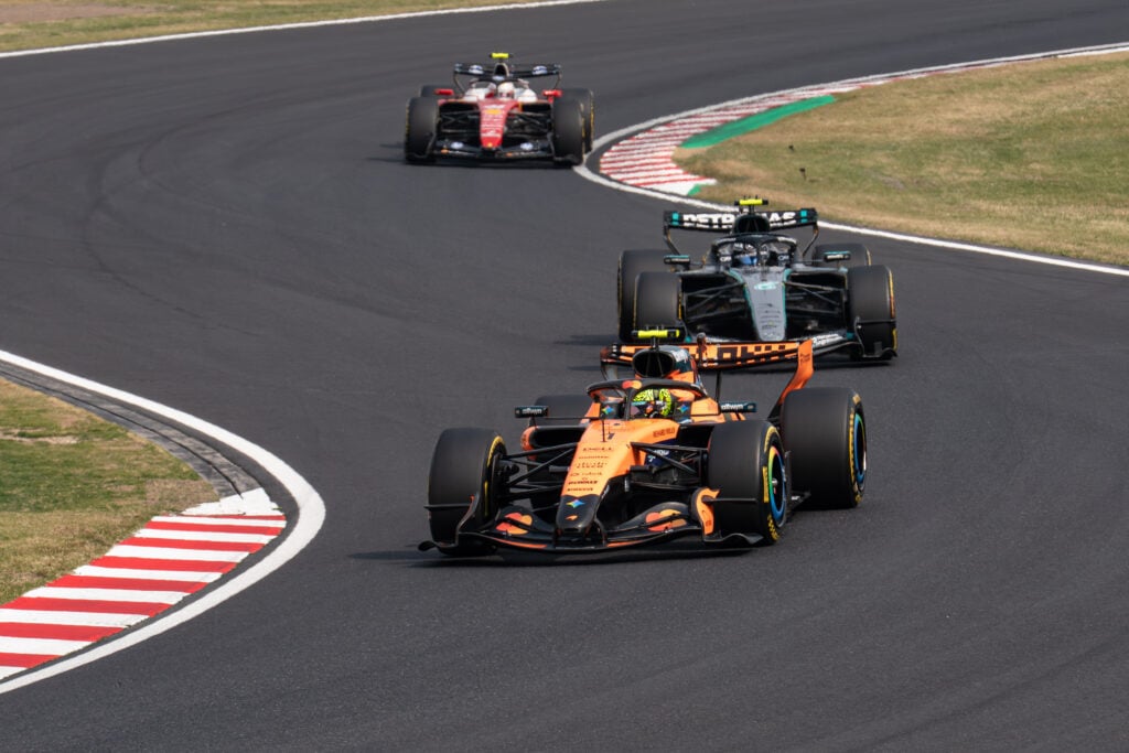 McLaren driver Lando Norris on track ahead of Mercedes' George Russell and Ferrari's Lewis Hamilton during the 2026 F1 Japanese Grand Prix