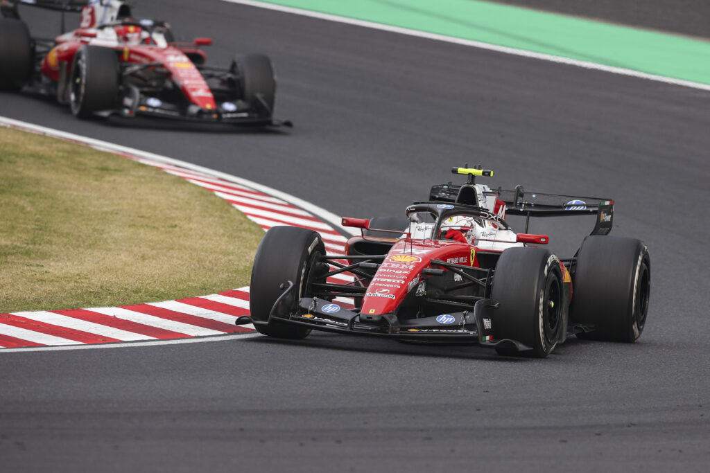 Lewis Hamilton of Scuderia Ferrari and Charles Leclerc of Scuderia Ferrari are seen ahead of the Japanese Grand Prix for the 2026 Formula 1 World Championship at the Suzuka Circuit in Suzuka, Japan, from March 26 to 29, 2026.