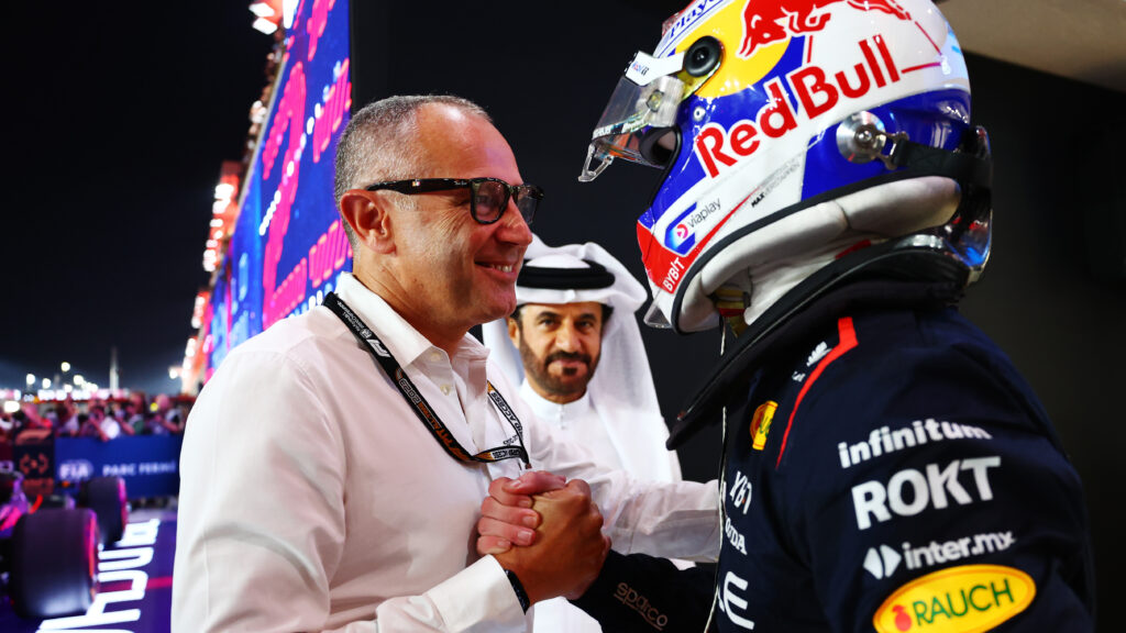 Formula 1 Group CEO Stefano Domenicali greets Red Bull driver Max Verstappen.